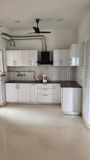 Kitchen in 3 BHK Apartment at Samridhi Luxuriya Avenue, Sector 150 – for Rent
