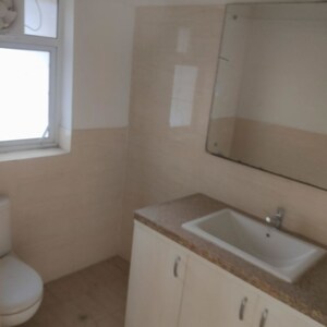 Bathroom in 4 BHK Builder Floor at Sector 21 – for Rent
