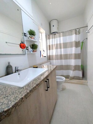 Bathroom in 4 BHK Builder Floor at Sector 22 – for Rent