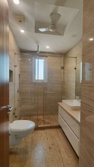 Bathroom in 4 BHK Builder Floor at Green Park Extension – for Rent