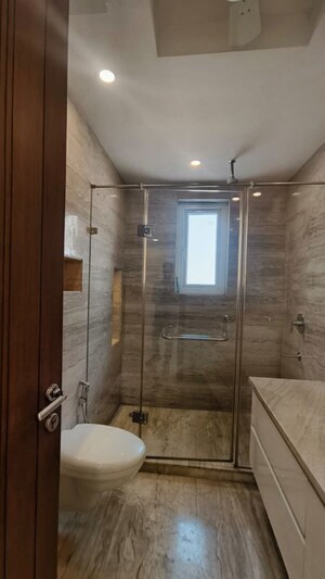 Bathroom in 4 BHK Builder Floor at Green Park Extension – for Rent