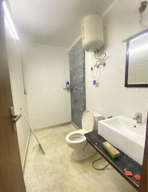 Bathroom in 3 BHK Builder Floor at Ramesh Nagar – for Rent
