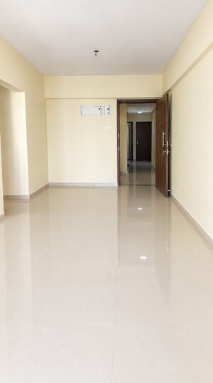 Living Room in 2 BHK Apartment at Rustomjee Avenue L1, Virar West – for Rent