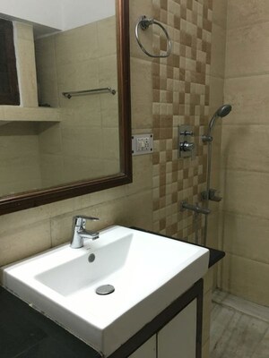 Bathroom in 3 BHK Builder Floor at Green Park – for Rent