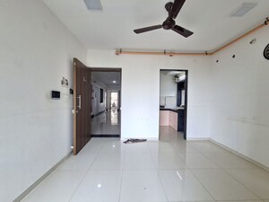 Living Room in 2 BHK Apartment at Runwal Eirene, Balkum Pada – for Sale