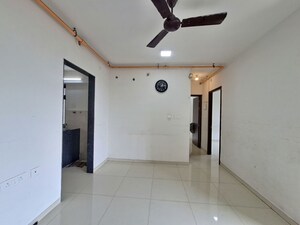 Living Room in 2 BHK Apartment at Runwal Eirene, Balkum Pada – for Sale