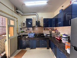 Kitchen in 3 BHK Apartment at Aims Golf City, Sector 75 – for Sale