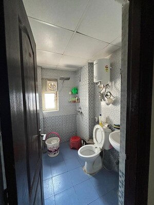 Bathroom in 3 BHK Apartment at Aims Golf City, Sector 75 – for Sale