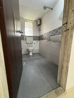 Bathroom in 2 BHK Apartment at Kia Park Apartments, Andheri West – for Rent