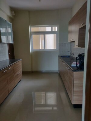 Kitchen in 3 BHK Apartment at ATS Golf Meadows, Central Derabassi – for Rent