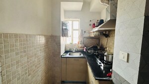 Kitchen in 1 BHK Apartment at Paras Tierea, Sector 137 – for Rent