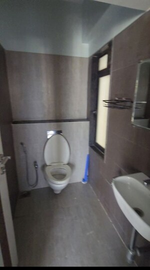 Bathroom in 1 BHK Apartment at Rustomjee Meridian, Kandivali West – for Rent