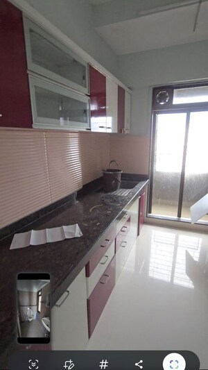 Kitchen in 1 BHK Apartment at Rustomjee Meridian, Kandivali West – for Rent