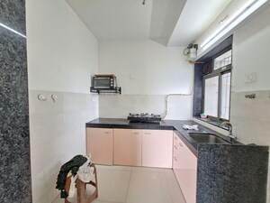 Kitchen in 2 BHK Apartment at Runwal Eirene, Balkum Pada – for Rent