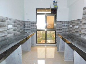 Kitchen in 3 BHK Apartment at Wadia Colony – for Sale