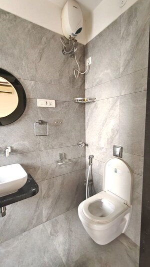 Bathroom in 2 BHK Apartment at Wisemen Fressia Rainbello, Malad East – for Rent