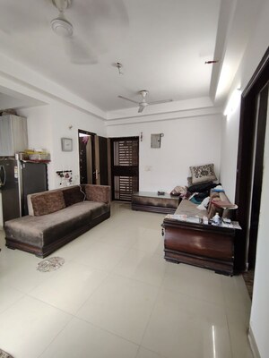 Living Room in 2 BHK Apartment at Galaxy North Avenue, Gaur City 1 – for Rent