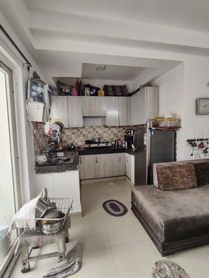 Living Room in 2 BHK Apartment at Galaxy North Avenue, Gaur City 1 – for Rent