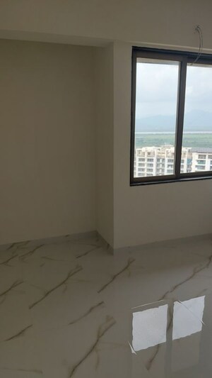 Room in 2 BHK Apartment at Paradigm Zenith Pushpanjali Residency Phase III, Ghodbunder Road – for Sale