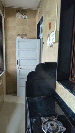 Kitchen in 1 BHK Apartment at Shri Kumar Society, Santacruz East – for Rent