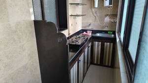 Kitchen in 1 BHK Apartment at Shri Kumar Society, Santacruz East – for Rent