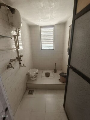 Bathroom in 2 BHK Apartment at Seema CHS Vasai, Vasai West – for Rent