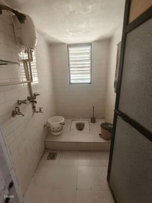 Bathroom in 2 BHK Apartment at Seema CHS Vasai, Vasai West – for Rent