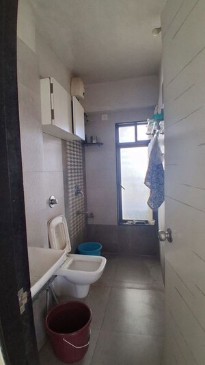 Bathroom in 1 BHK Apartment at Lukhi Residency, Malad East – for Rent