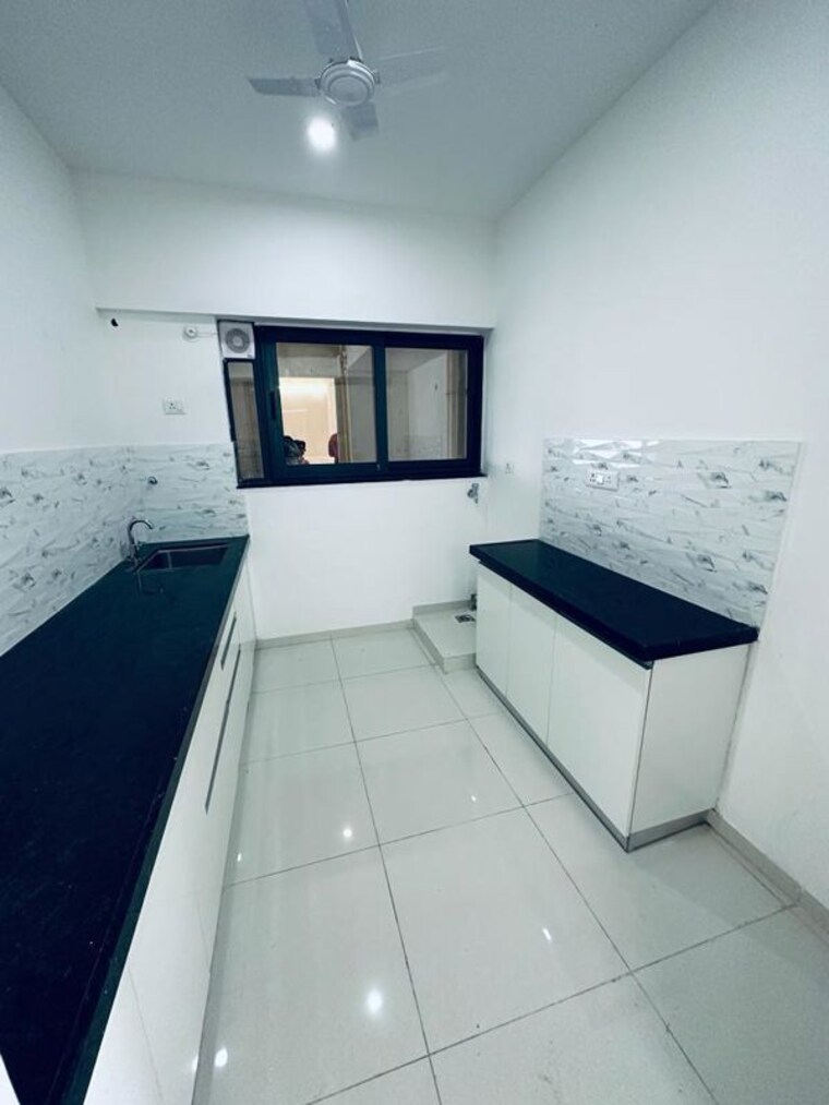 Kitchen, amanora-gold-towers 2 Bedroom 646 Sq.Ft. Apartment In Hadapsar Pune 10708780