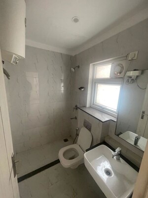 Bathroom in 3 BHK Apartment at Smart World Orchard, Sector 61 – for Rent