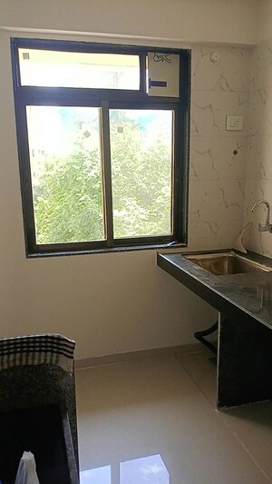 Kitchen in 1 BHK Apartment at K M Horizon Palms, Owale – for Rent