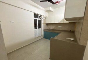 Kitchen in 2 BHK Apartment at Dosti West County, Balkum Pada – for Rent