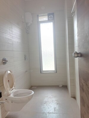 Bathroom in 1 BHK Apartment at Ajmera Boulevard, Malad West – for Rent