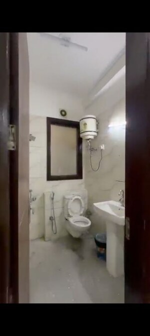 Bathroom in 2 BHK Builder Floor at Palm Residency Chhatarpur, Chattarpur – for Rent