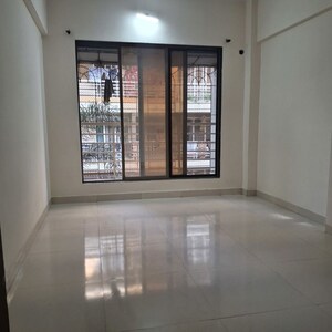 Living Room in 1 BHK Apartment at SK Heights, Ghansoli – for Rent