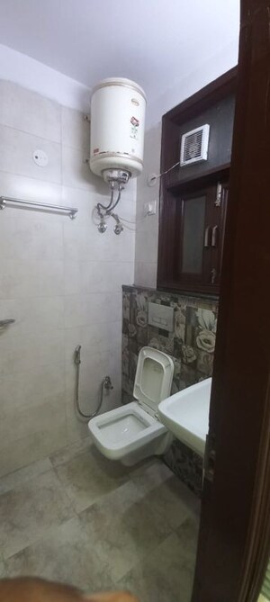 Bathroom in 2 BHK Builder Floor at Chattarpur – for Rent