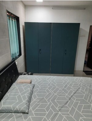 Bedroom in 2 BHK Apartment at Satellite Garden, Goregaon East – for Rent