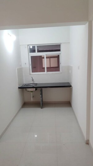 Kitchen in 2 BHK Apartment at Kolte Patil Life Republic, Hinjewadi – for Rent