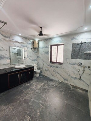 Bathroom in 2 BHK Builder Floor at Nehru Enclave – for Rent