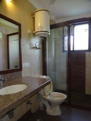 Bathroom in 3 BHK Builder Floor at New Friends Colony – for Rent