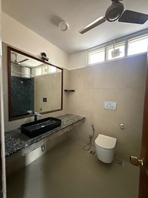 Bathroom in 3 BHK Builder Floor at New Friends Colony – for Rent