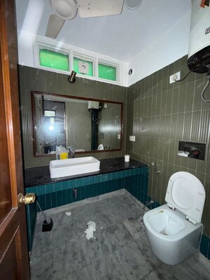 Bathroom in 3 BHK Builder Floor at New Friends Colony – for Rent