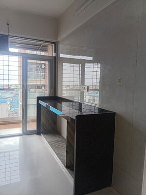 Kitchen in 3 BHK Apartment at Seawoods Sector 40 – for Sale