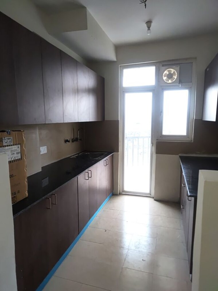Kitchen, sector 107 3 Bedroom 1575 Sq.Ft. Apartment In Sector 107 Noida 10709286