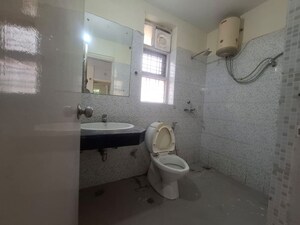 Bathroom in 4 BHK Apartment at Unitech Uniworld Gardens, Sector 47 – for Sale