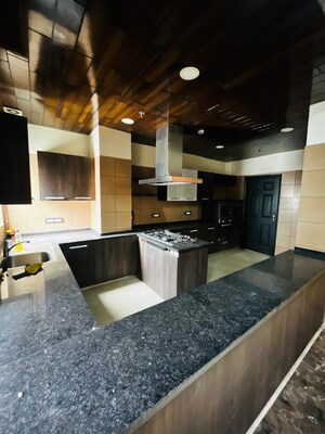 Kitchen in 5 BHK Apartment at Dasnac The Jewel, Sector 75 – for Rent