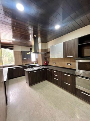 Kitchen in 5 BHK Apartment at Dasnac The Jewel, Sector 75 – for Rent