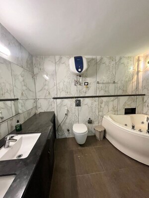 Bathroom in 5 BHK Apartment at Dasnac The Jewel, Sector 75 – for Rent