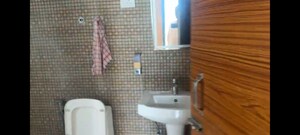 Bathroom in 3 BHK Apartment at JKG Palm Resort, Raj Nagar Extension – for Rent