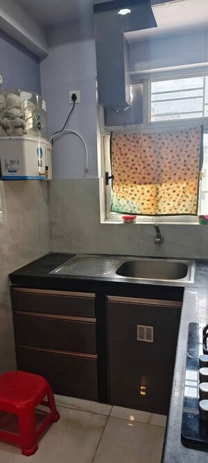 Kitchen in 2 BHK Apartment at Fort Sunny Fort, Rajarhat New Town – for Rent